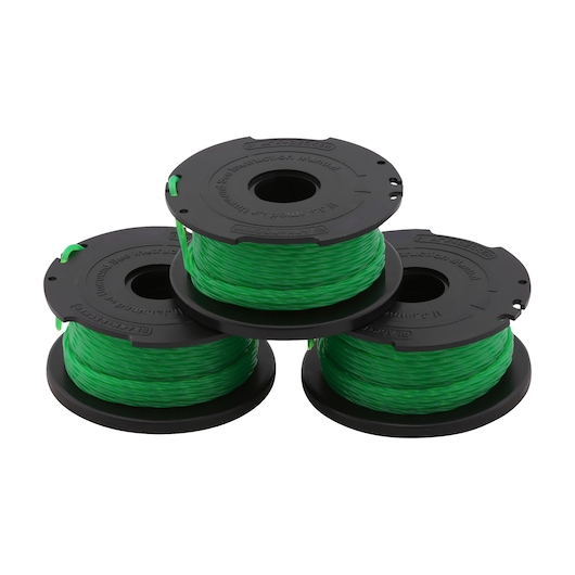Three BLACK+DECKER replacement spool reels with green trimmer line for garden tools, stacked together.