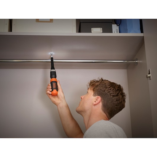 Photo of BLACKDECKER BCF601C electric screwdriver used for installing a closet rod bracket.