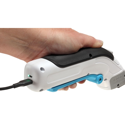 BLACKDECKER BCSC115 electric screwdriver side view, white and black grip, charging with cable.