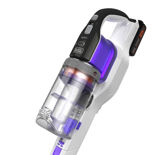 Close-up image of a BLACK+DECKER cordless vacuum cleaner with a transparent dust container and purple accents.