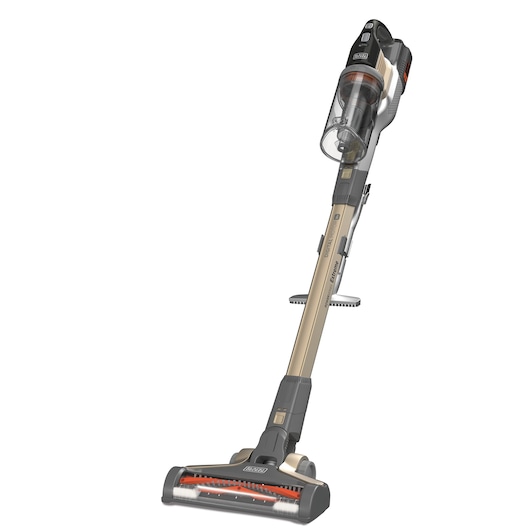 A cordless stick vacuum cleaner from BLACK+DECKER with gold and black design, featuring a transparent dust container and a multi-surface cleaning head.