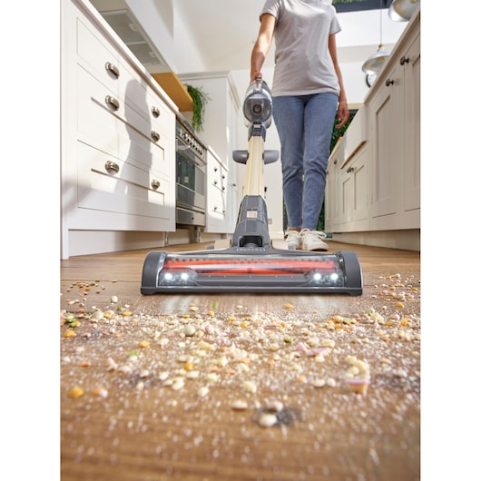 BLACKDECKER BHFEV36B2DW cordless stick vacuum cleaning kitchen floor, front angle