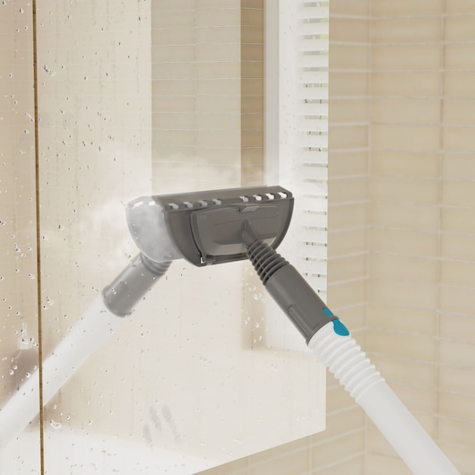 BLACKDECKER BHSMP2314 steam cleaning tool on wet glass surface in bathroom setting