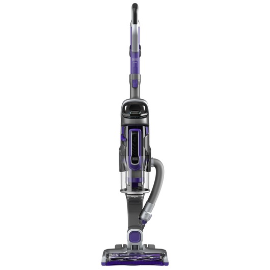 Upright vacuum cleaner with a transparent dust container, detachable hose, and a purple and grey design, shown standing upright.